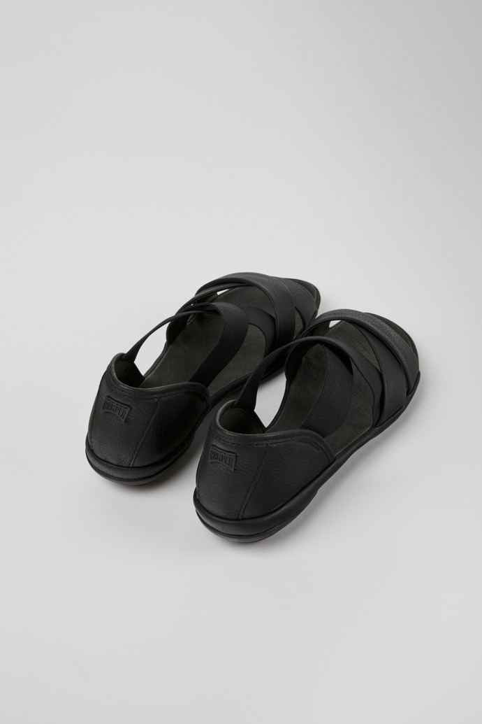 Back view of Right Black leather sandals for women
