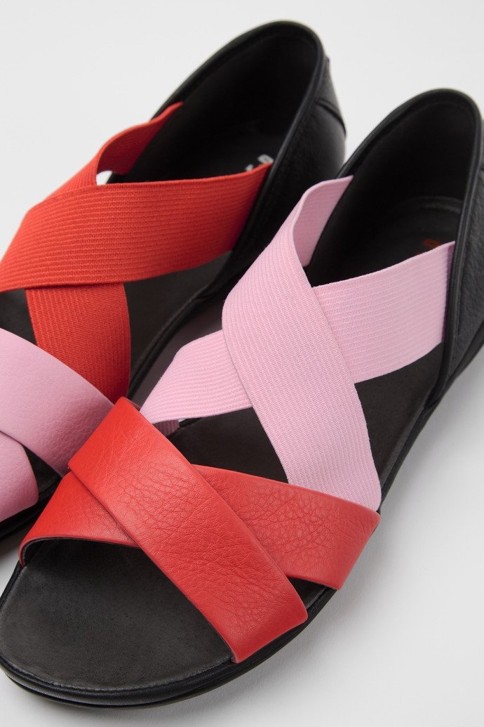 Close-up view of Twins Pink and red leather sandals for women