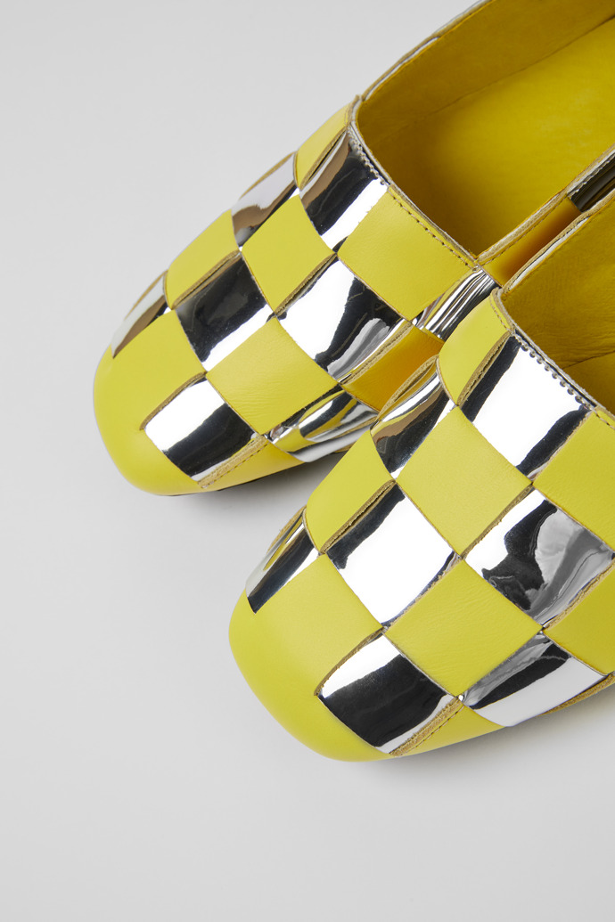 Close-up view of Casi Myra Yellow and silver shoes for women