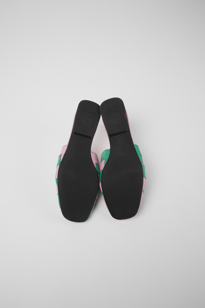 The soles of Twins Pink and green leather shoes for women