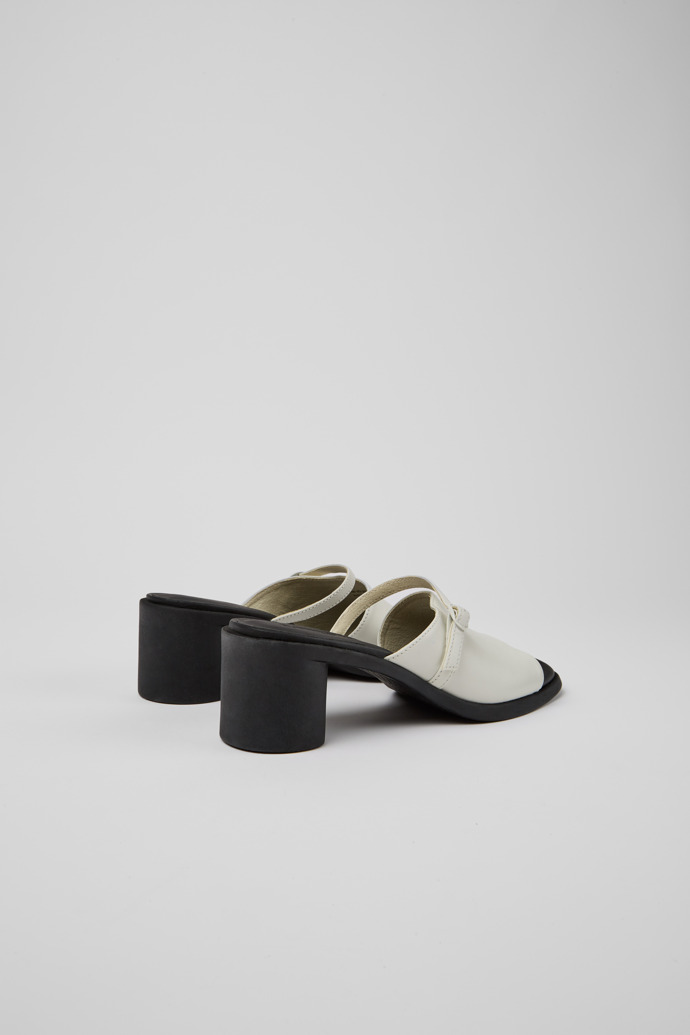 Back view of Meda White and black leather sandals for women