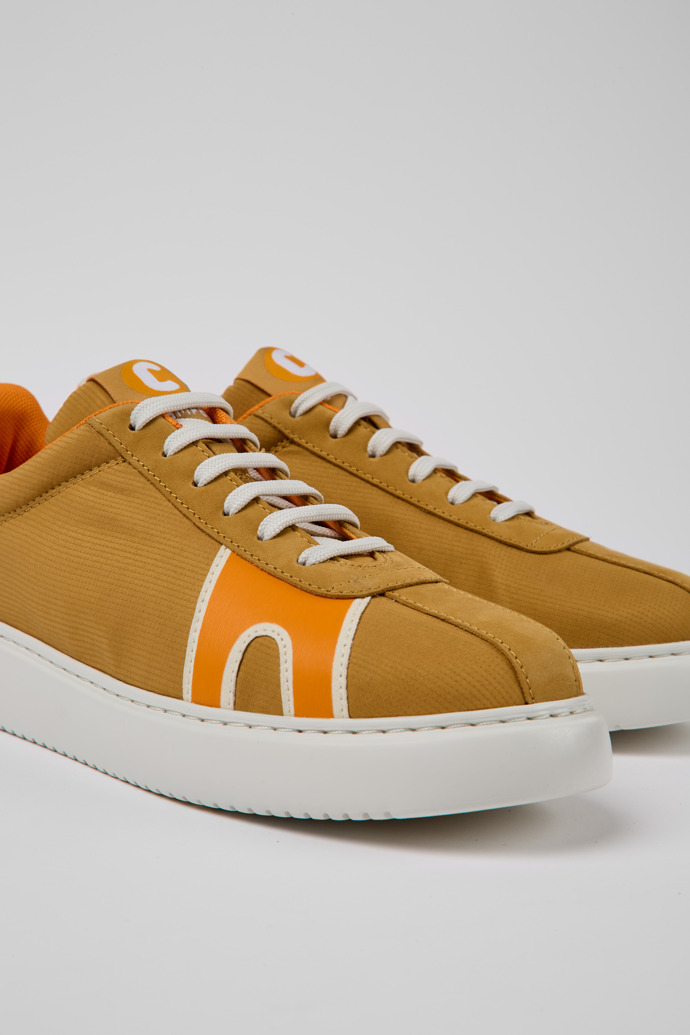 Close-up view of Runner K21 Beige and orange sneakers for women