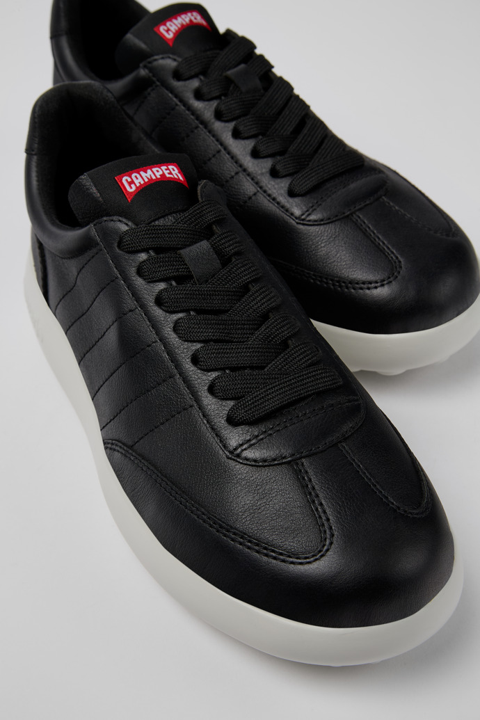 Close-up view of Pelotas Xlite Black Sneaker for Women