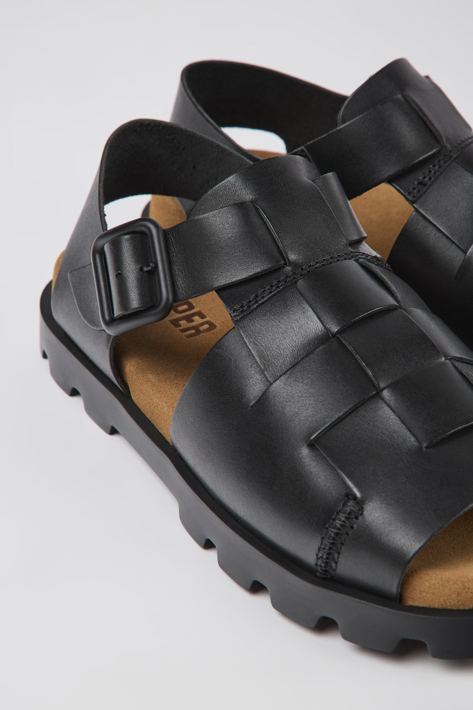 Close-up view of Brutus Sandal Black leather sandals for women