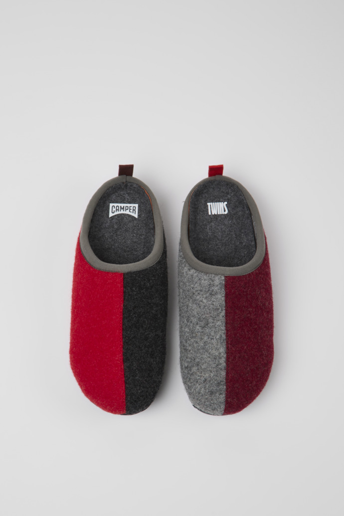 Overhead view of Twins Gray, red, and burgundy wool slippers for women