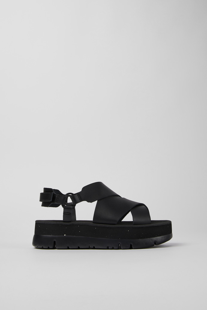 Side view of Oruga Up Black leather sandals for women