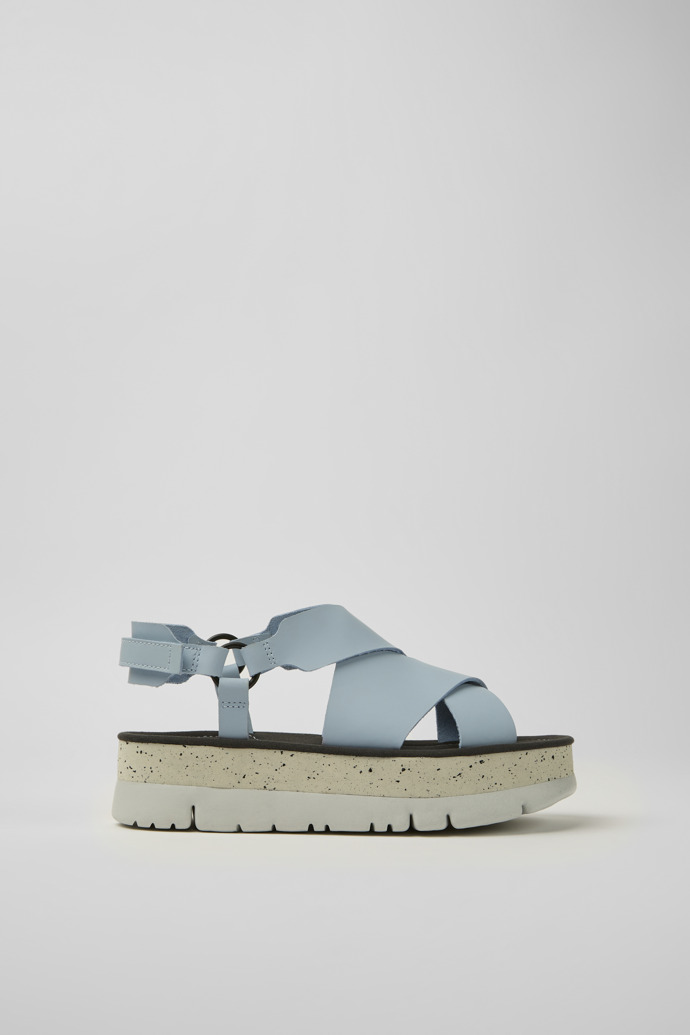 Side view of Oruga Up Blue leather sandals for women