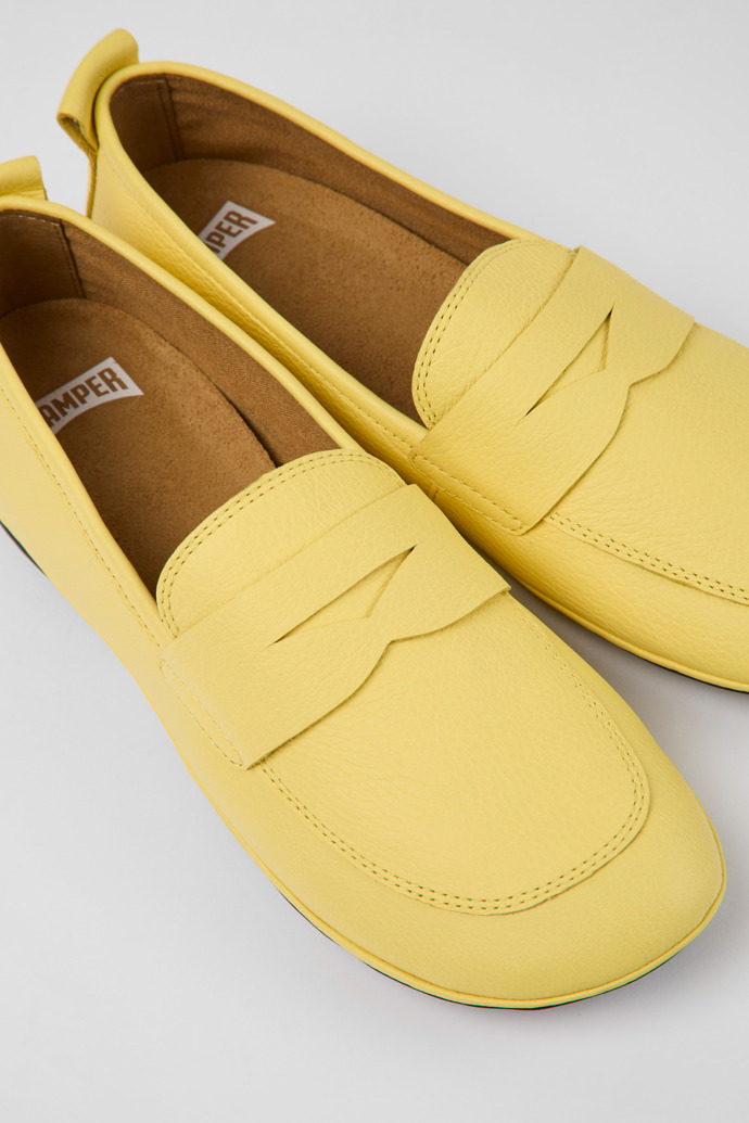 Close-up view of Right Yellow leather shoes for women