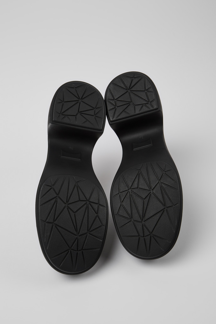 The soles of Thelma Black leather mules for women