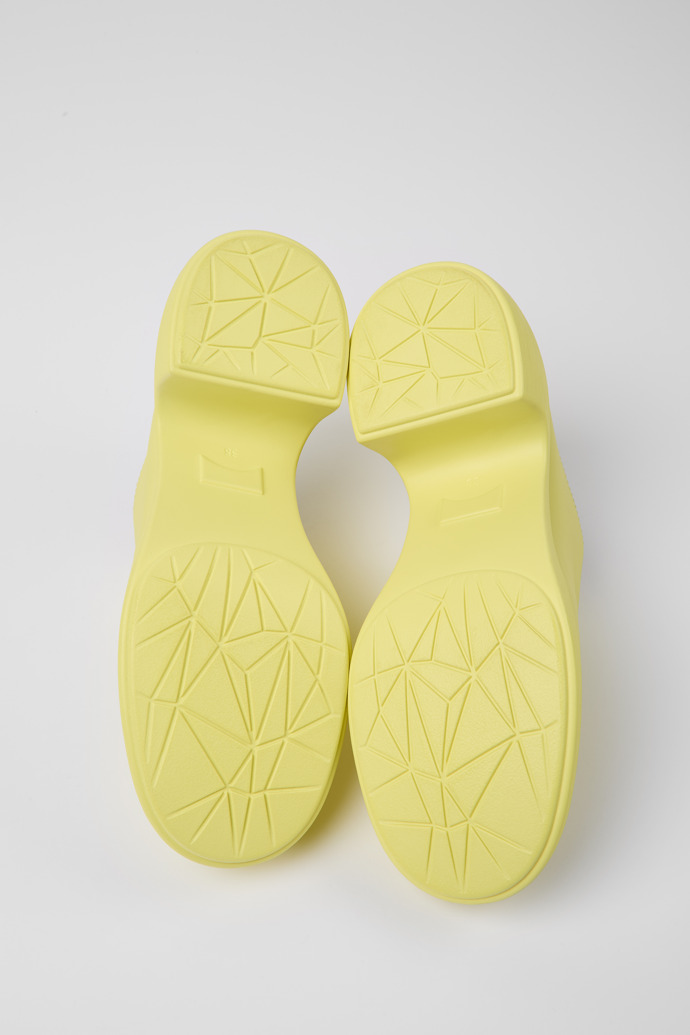 The soles of Thelma Yellow leather mules for women
