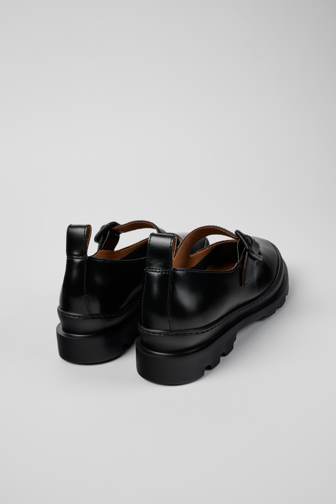 Back view of Brutus Black leather Mary Jane flats for women