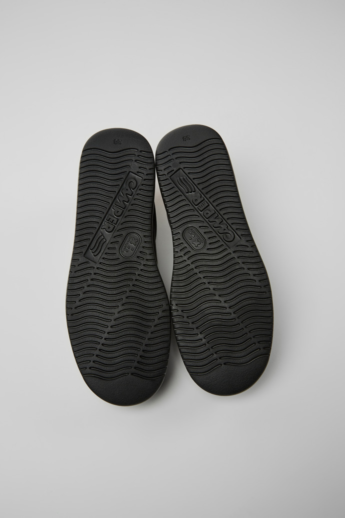 The soles of Runner K21 Black sneakers for women