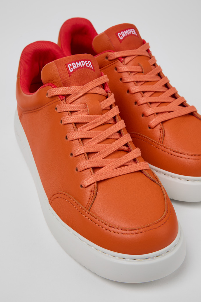 Close-up view of Runner K21 Orange leather sneakers for women