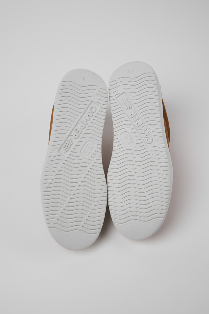The soles of Runner K21 Brown Suede Shoes for Women.