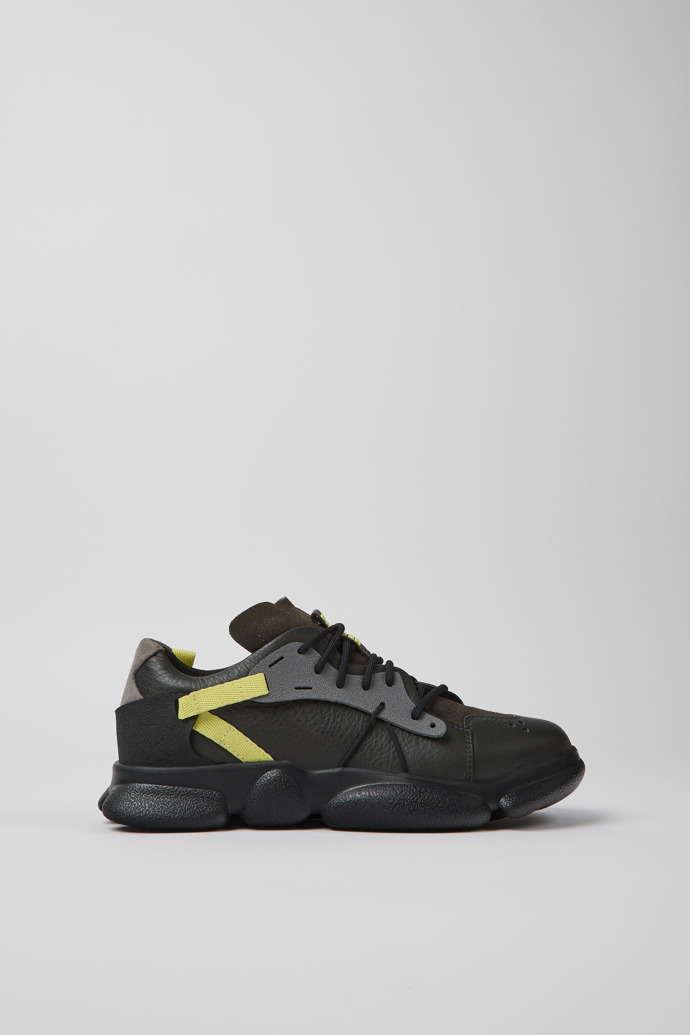 Side view of Twins Gray, yellow, and black leather sneakers for women