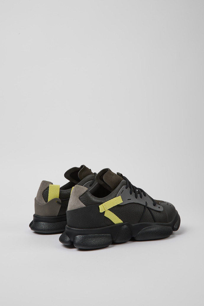 Back view of Twins Gray, yellow, and black leather sneakers for women