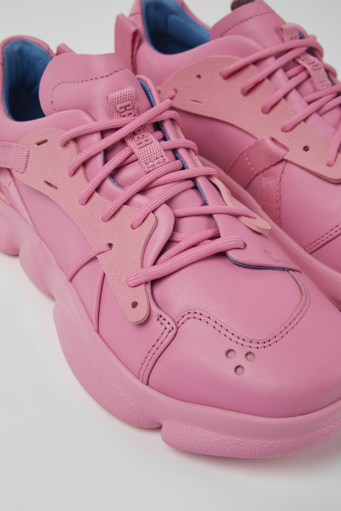 Close-up view of Karst Pink leather and textile sneakers for women