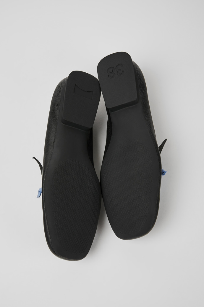 The soles of Casi Myra Black and blue leather loafers for women