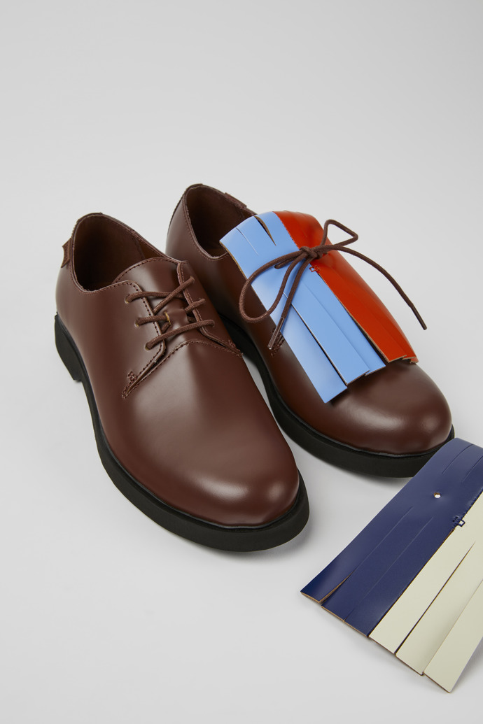 Close-up view of Twins Burgundy and blue leather shoes for women