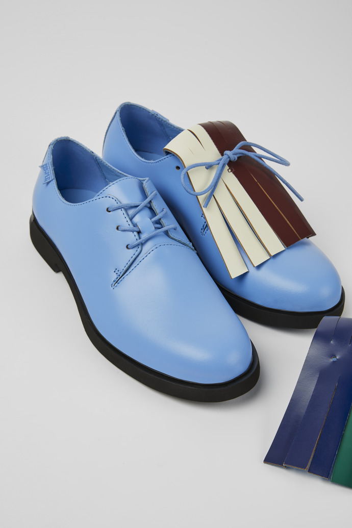 Close-up view of Twins Blue and green leather shoes for women