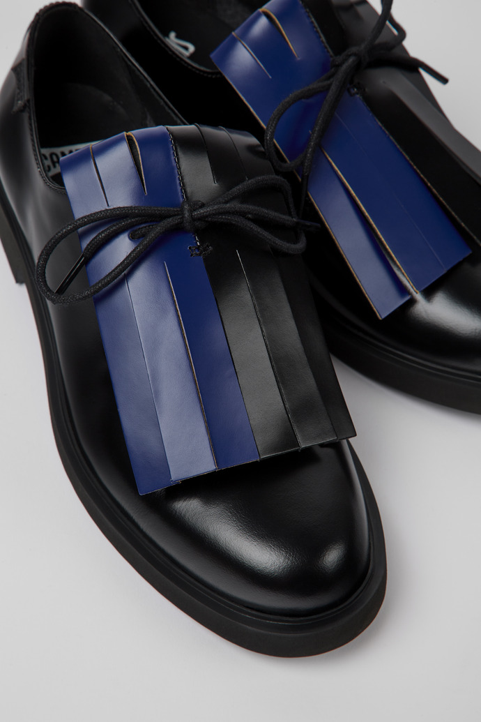 Close-up view of Twins Black and blue leather shoes for women