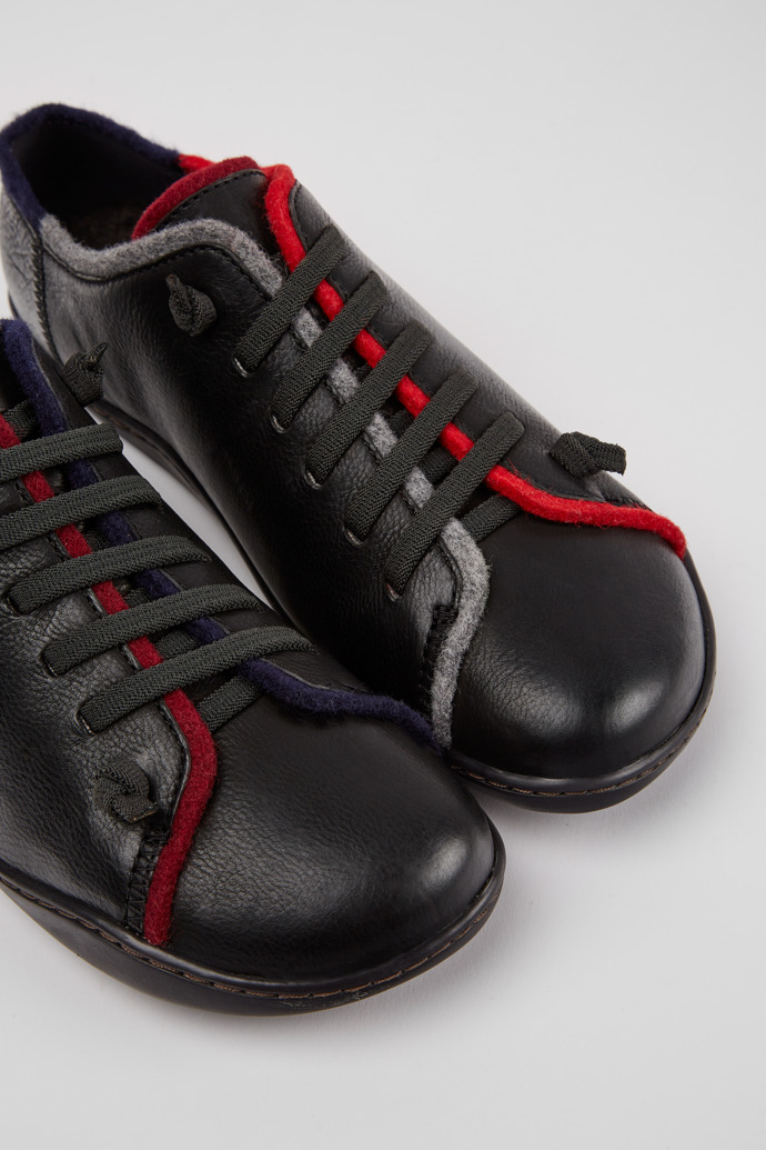 Close-up view of Twins Black leather and wool shoes for women