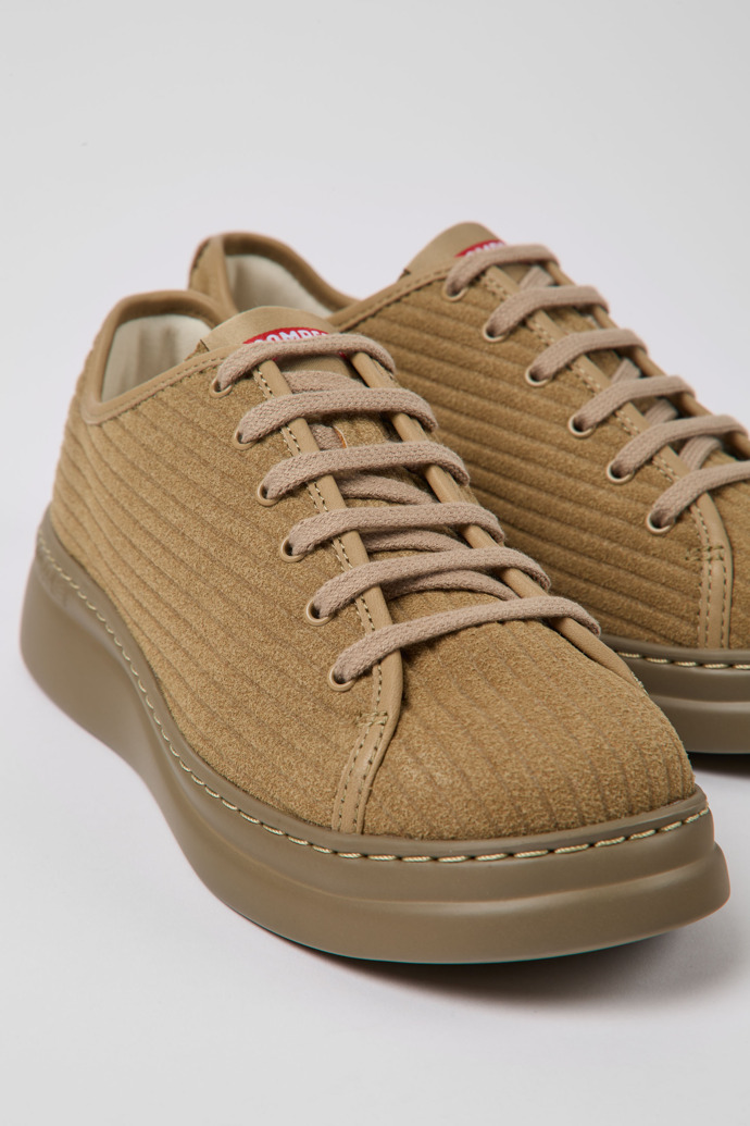 Close-up view of Runner Up Beige recycled leather sneakers for women
