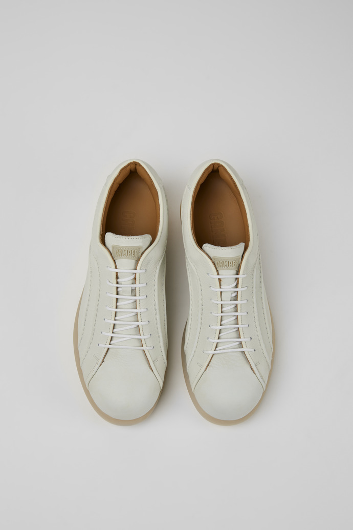 Overhead view of Pelotas White non-dyed leather sneakers for women