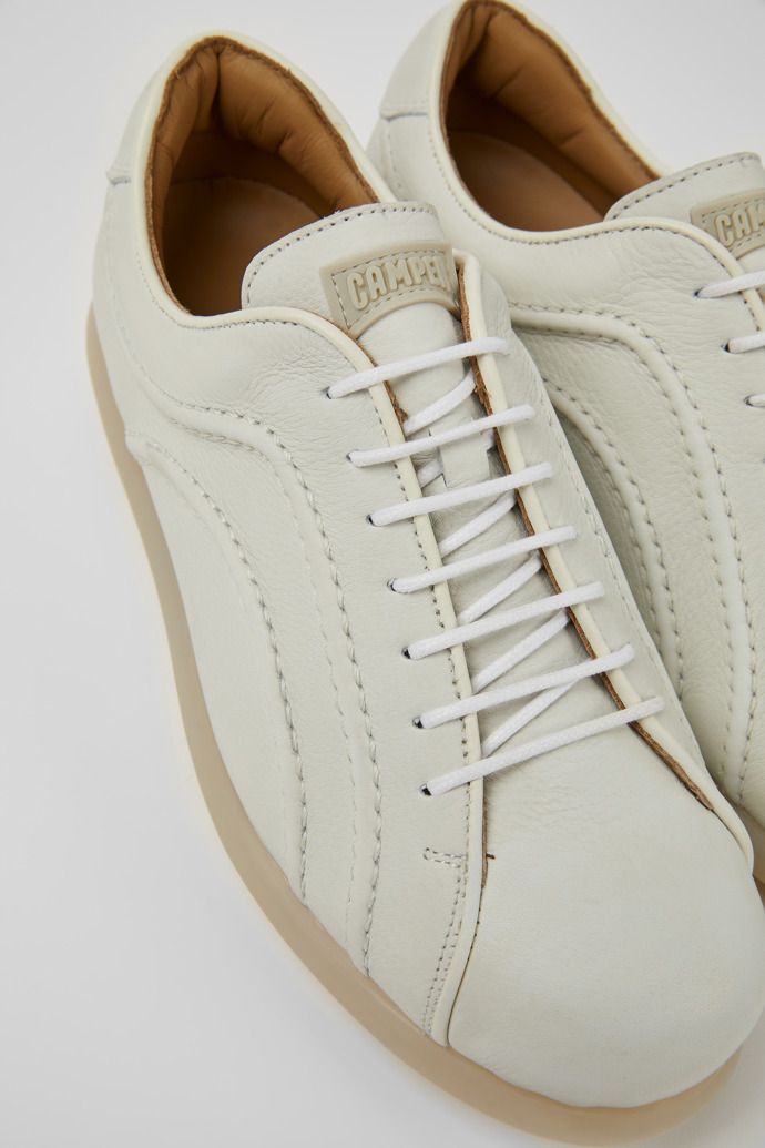 Close-up view of Pelotas White non-dyed leather sneakers for women