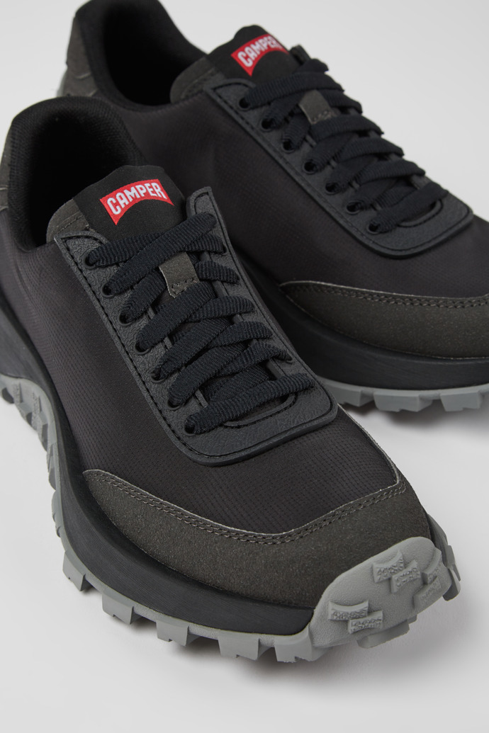 Close-up view of Drift Trail Black textile and nubuck sneakers for women