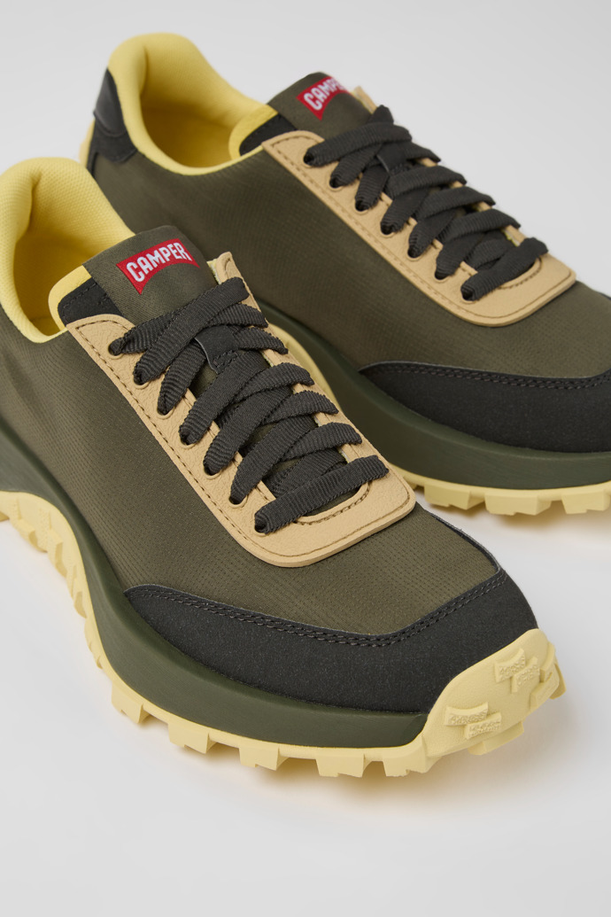 Close-up view of Drift Trail Green textile and nubuck sneakers for women
