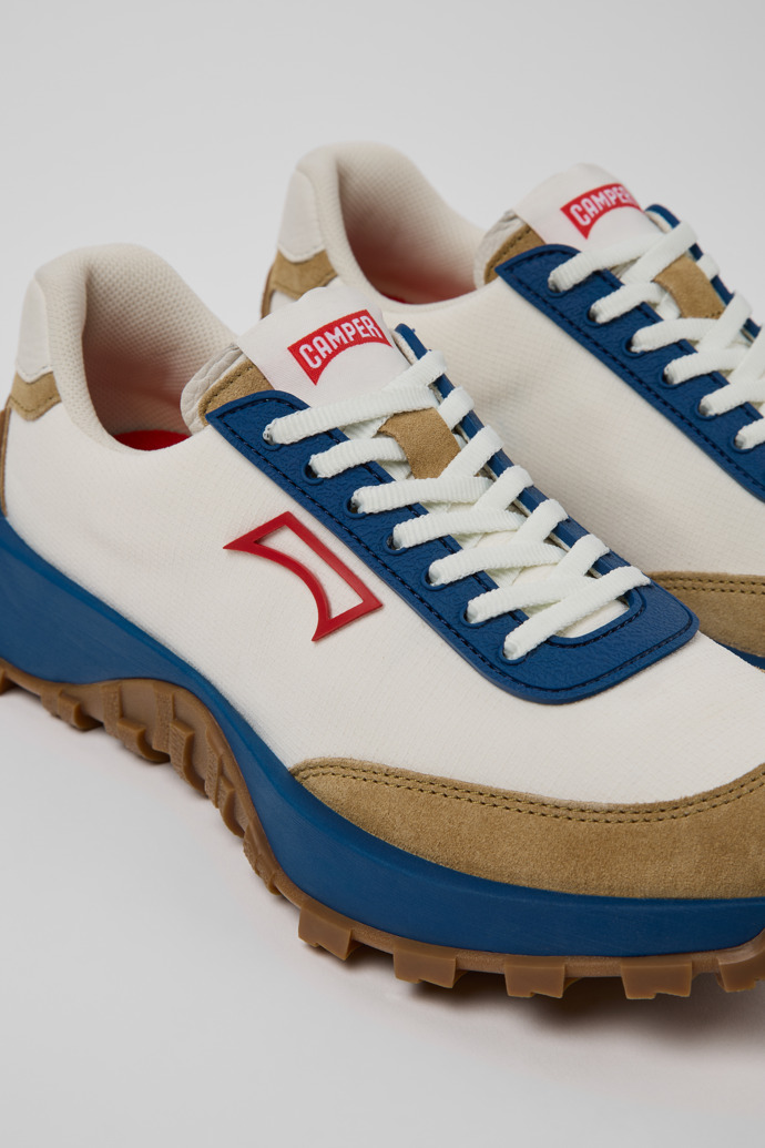 Close-up view of Drift Trail Multicolor Textile and Nubuck Leather Sneakers for Women.