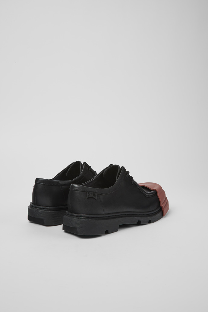 Back view of Junction Black Leather Wallabee Shoe for Women