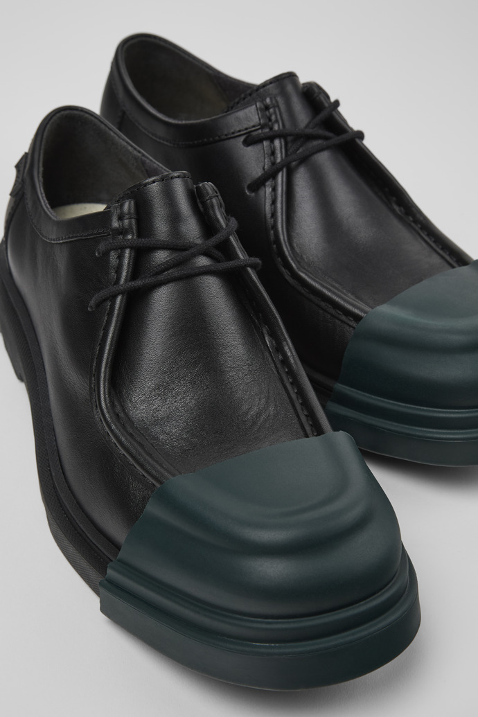 Close-up view of Junction Black leather shoes for women