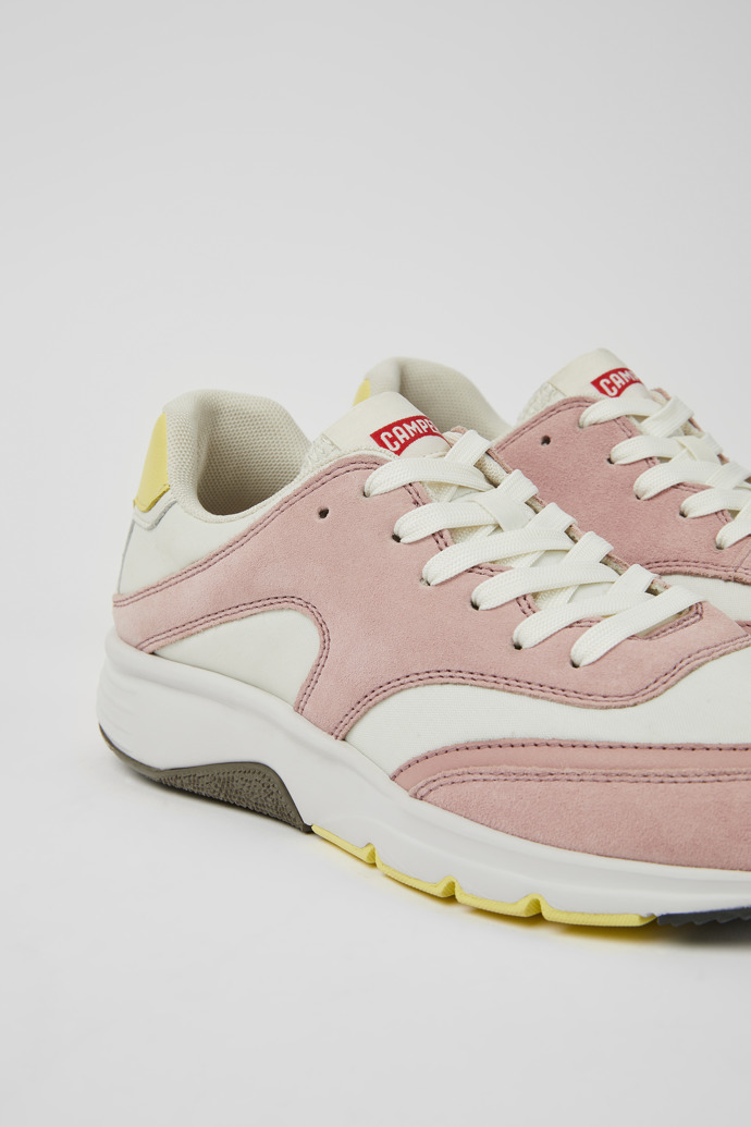 Close-up view of Drift White and pink textile and nubuck sneakers for women