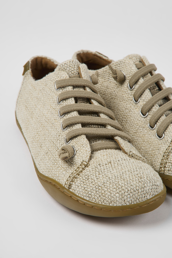 Close-up view of Peu Beige textile shoes for women