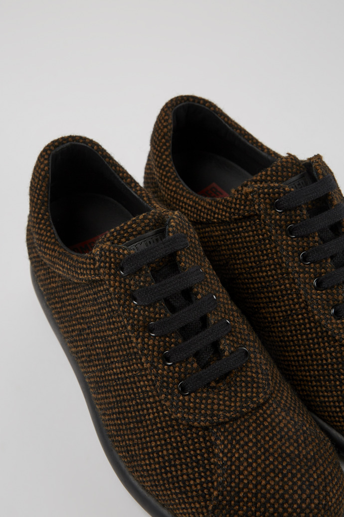 Close-up view of Pelotas Brown wool and viscose sneakers