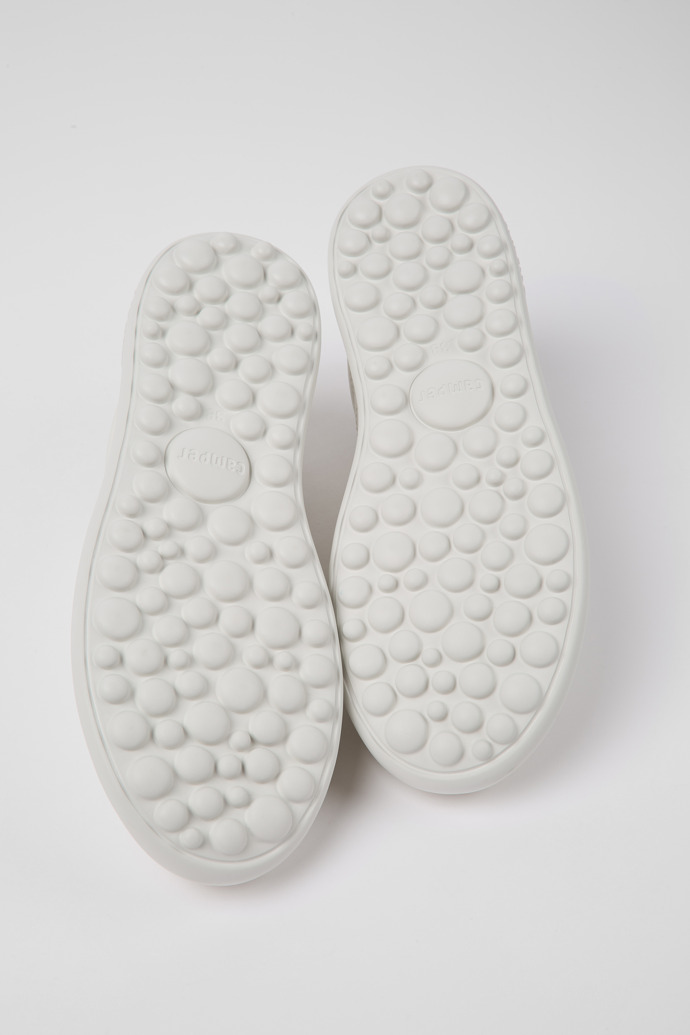 The soles of Pelotas XLite White leather sneakers for women