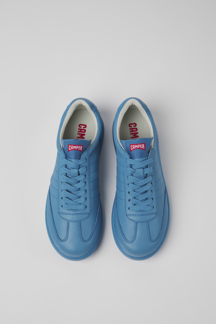 Overhead view of Pelotas XLite Blue leather sneakers for women