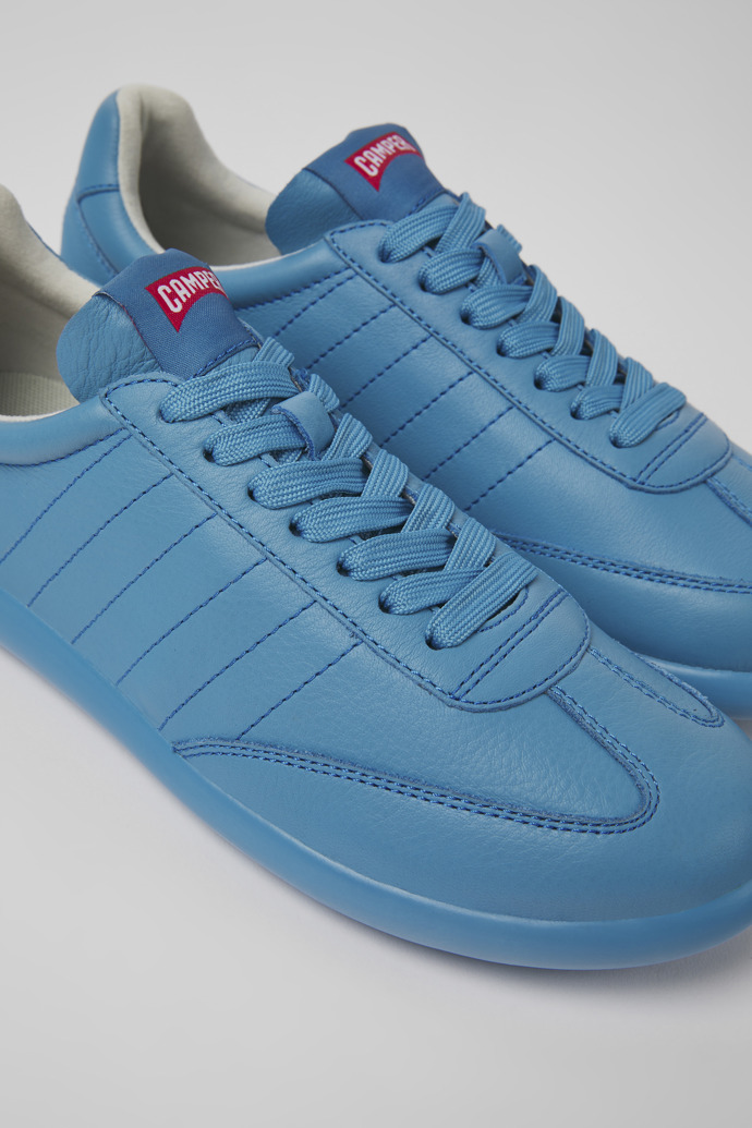 Close-up view of Pelotas XLite Blue leather sneakers for women