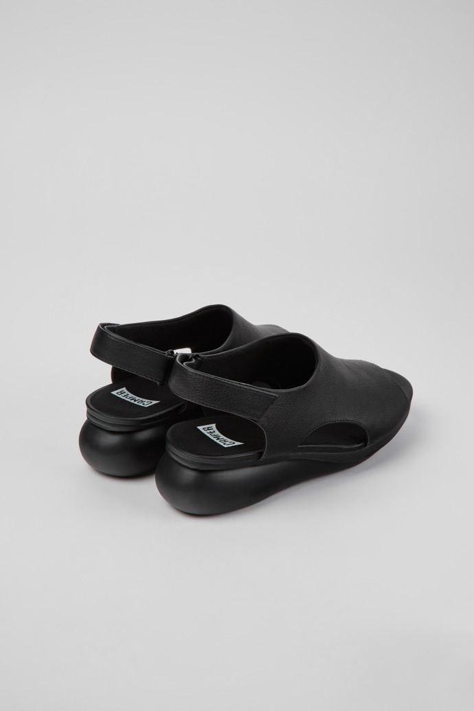 Back view of Balloon Black leather sandals for women
