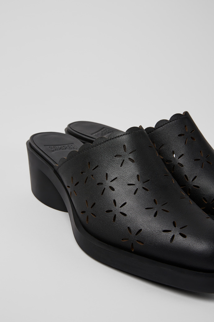 Close-up view of Bonnie Black leather mules for women