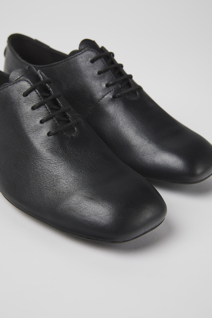 Close-up view of Casi Myra Black leather shoes for women