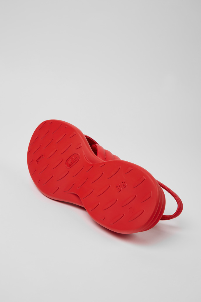 The soles of Spiro Red leather sandals for women