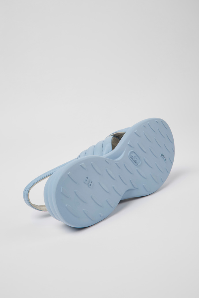 The soles of Spiro Blue leather sandals for women