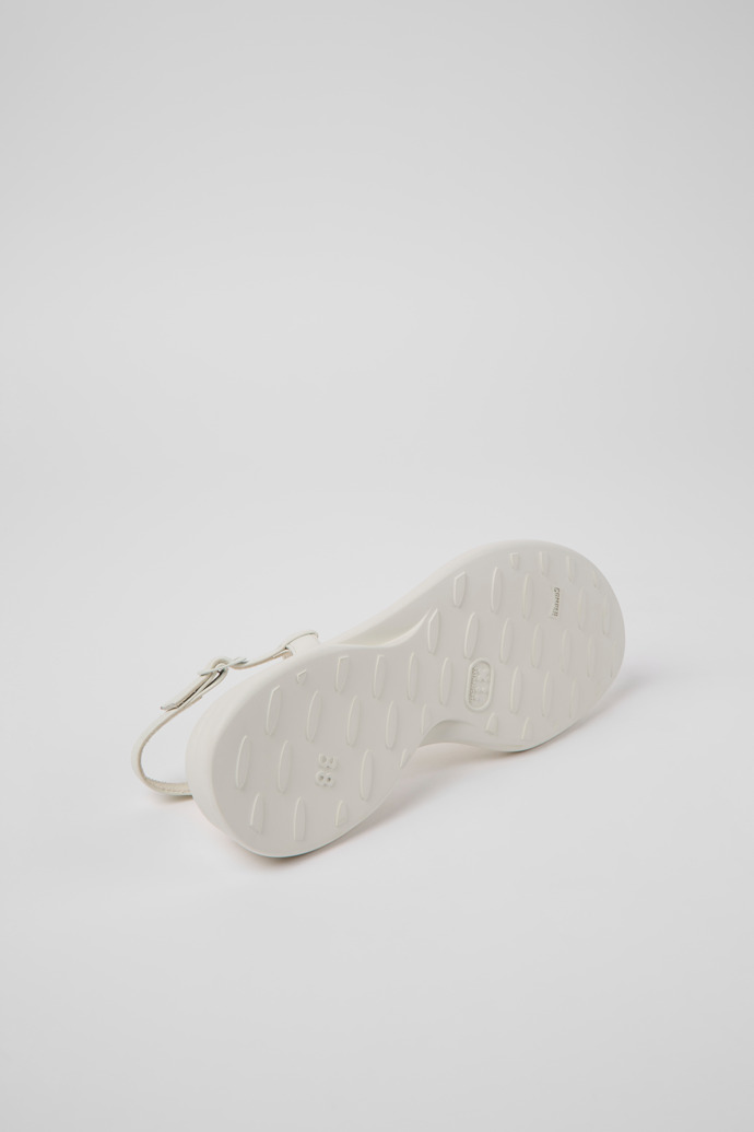 The soles of Spiro White leather sandals for women