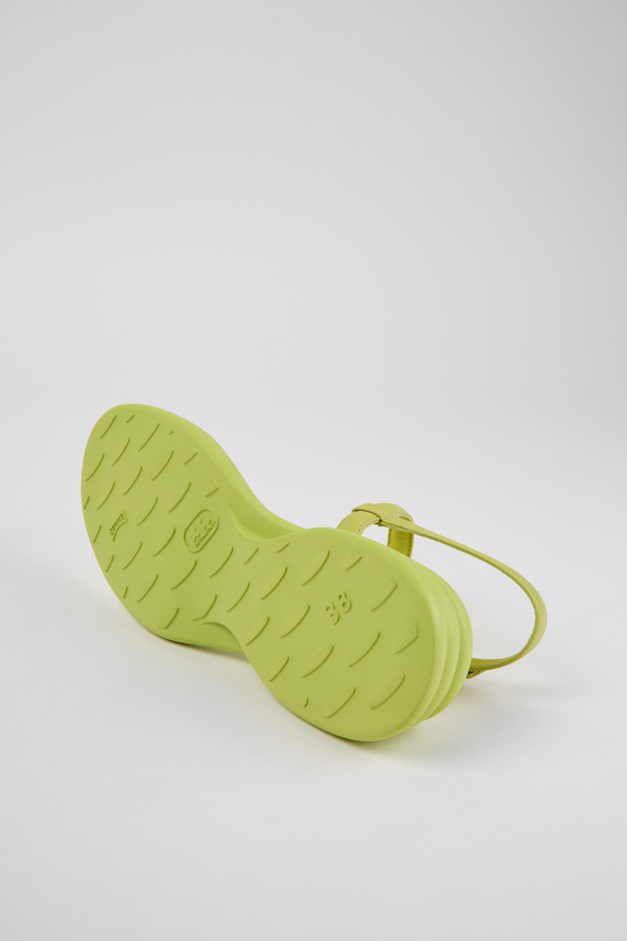 The soles of Spiro Green leather sandals for women