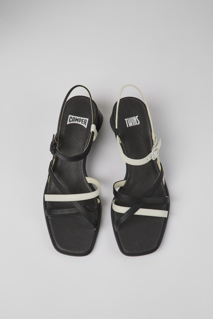 Overhead view of Twins Black and white leather sandals for women