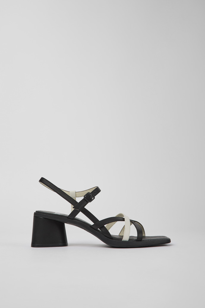 Side view of Twins Black and white leather sandals for women