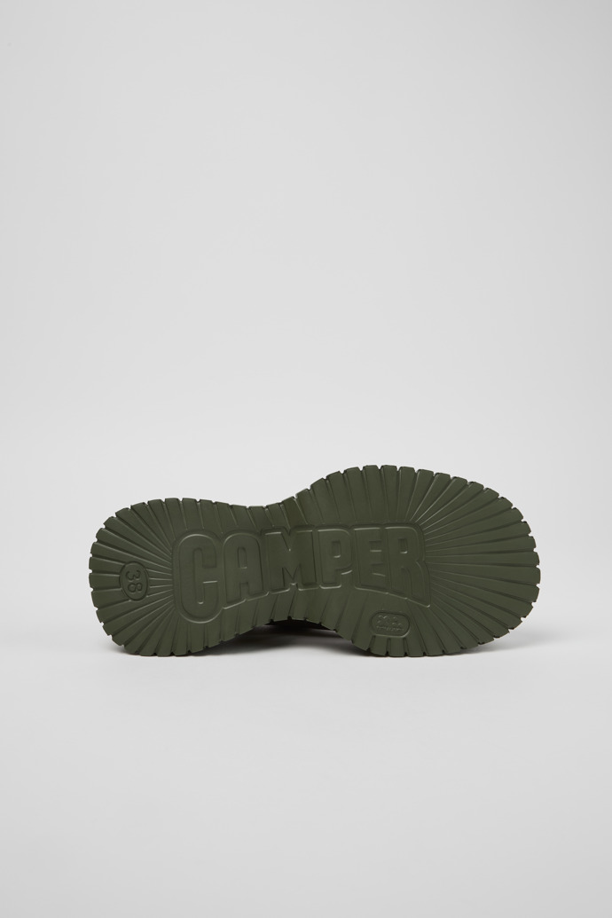 The soles of BCN Green Leather Sandals for Women.